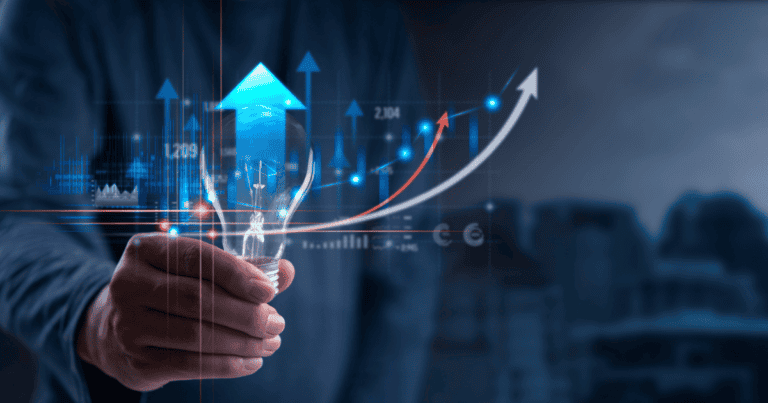 Hand-holding light bulb with upward graphs representing business growth and innovation for data analytics bootcamp