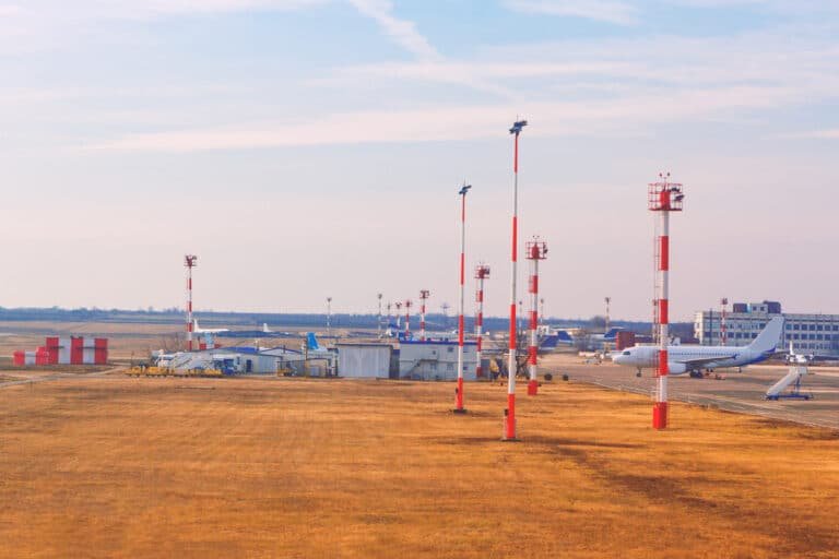 Airport with planes and control towers, and field equipment